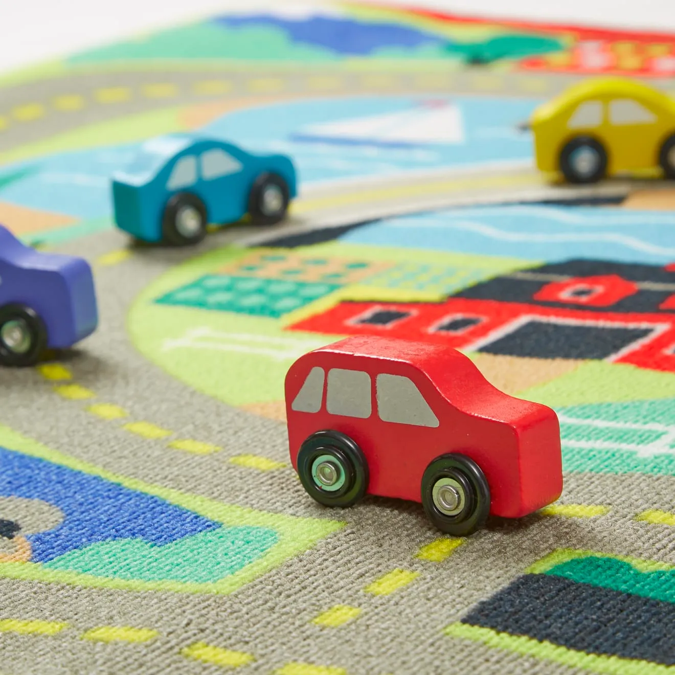 Melissa & Doug Round the Town speelkleed met 4 auto's