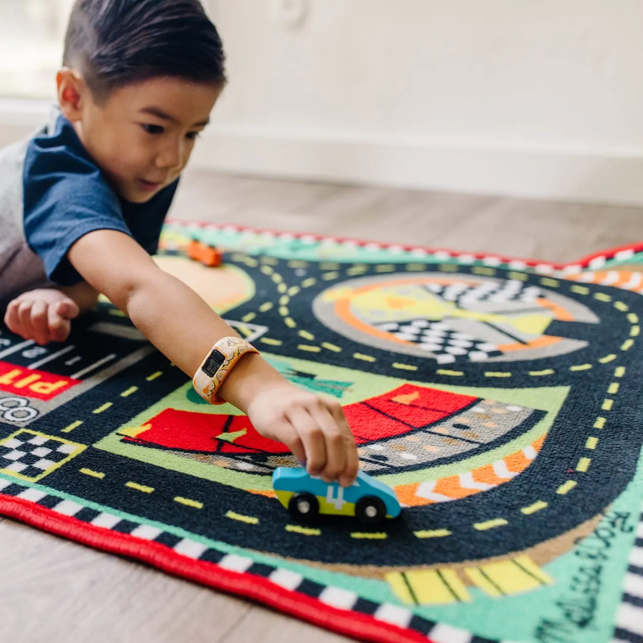 Melissa & Doug Speedway Racebaan speelkleed met 4 auto’s