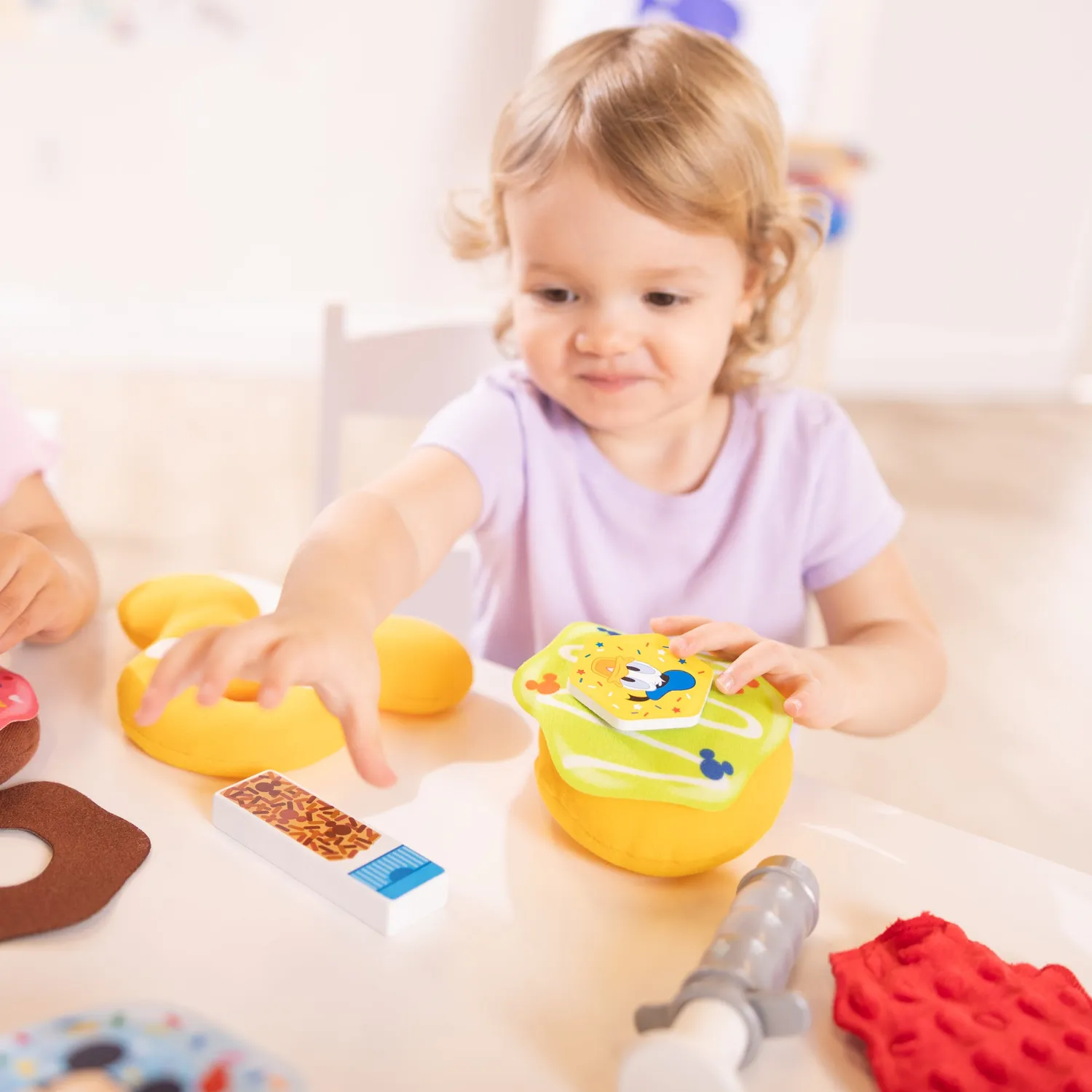 Melissa & Doug Disney Donuts speelset met slotenbord
