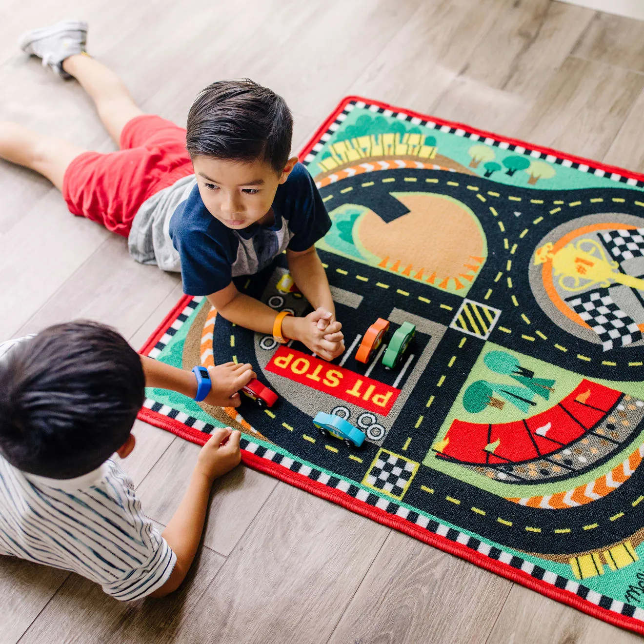 Melissa & Doug Speedway Racebaan speelkleed met 4 auto’s