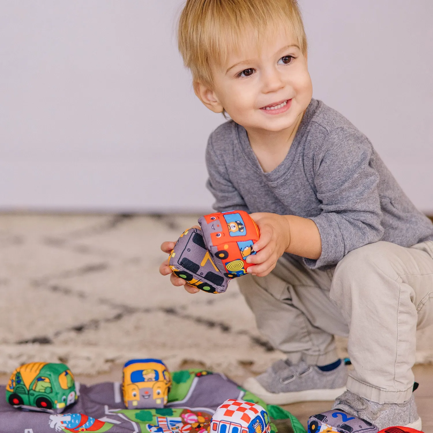 Melissa & Doug Take-Along Town speelkleed met 9 voertuigen