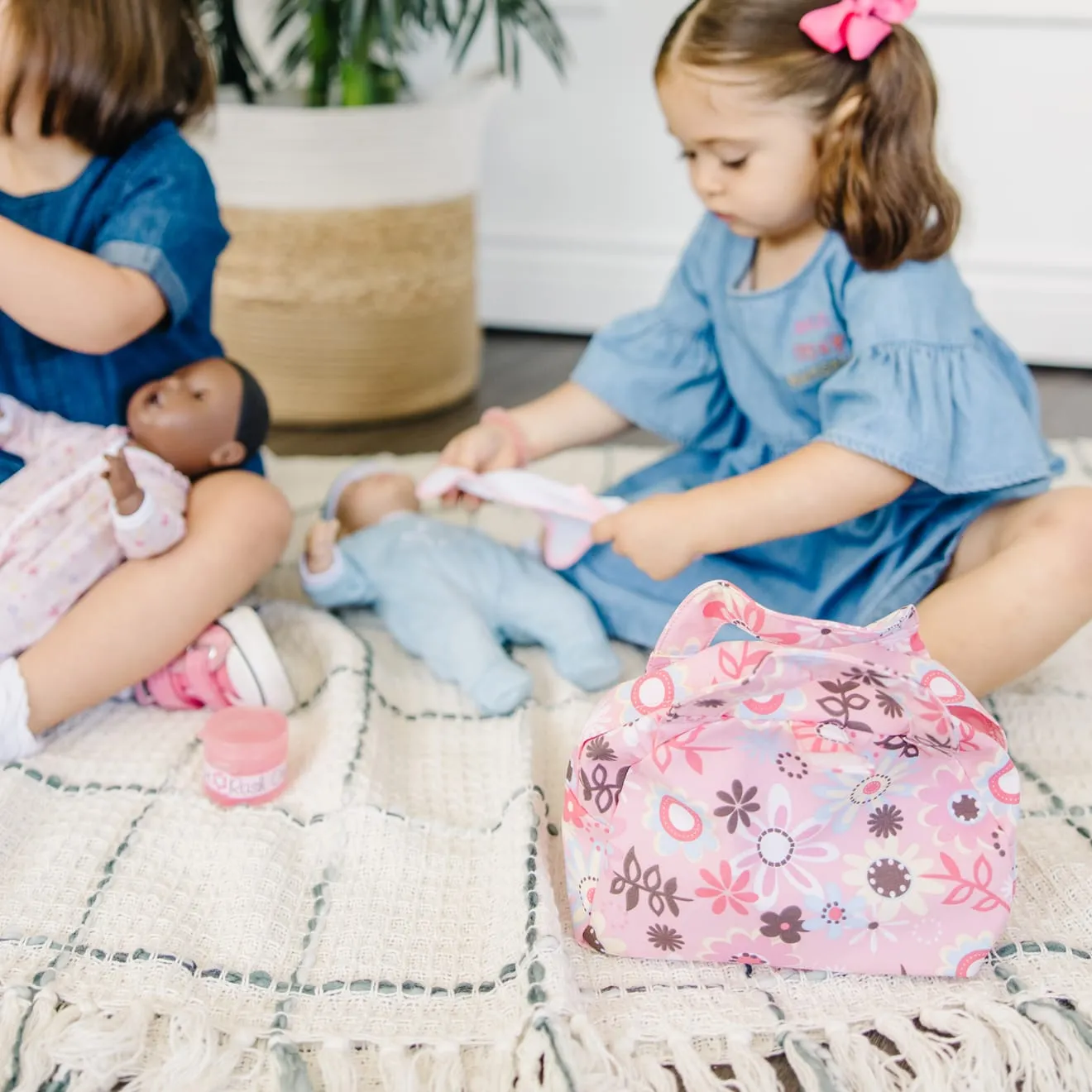 Melissa & Doug Mine to Love luiertas poppenset bloemen