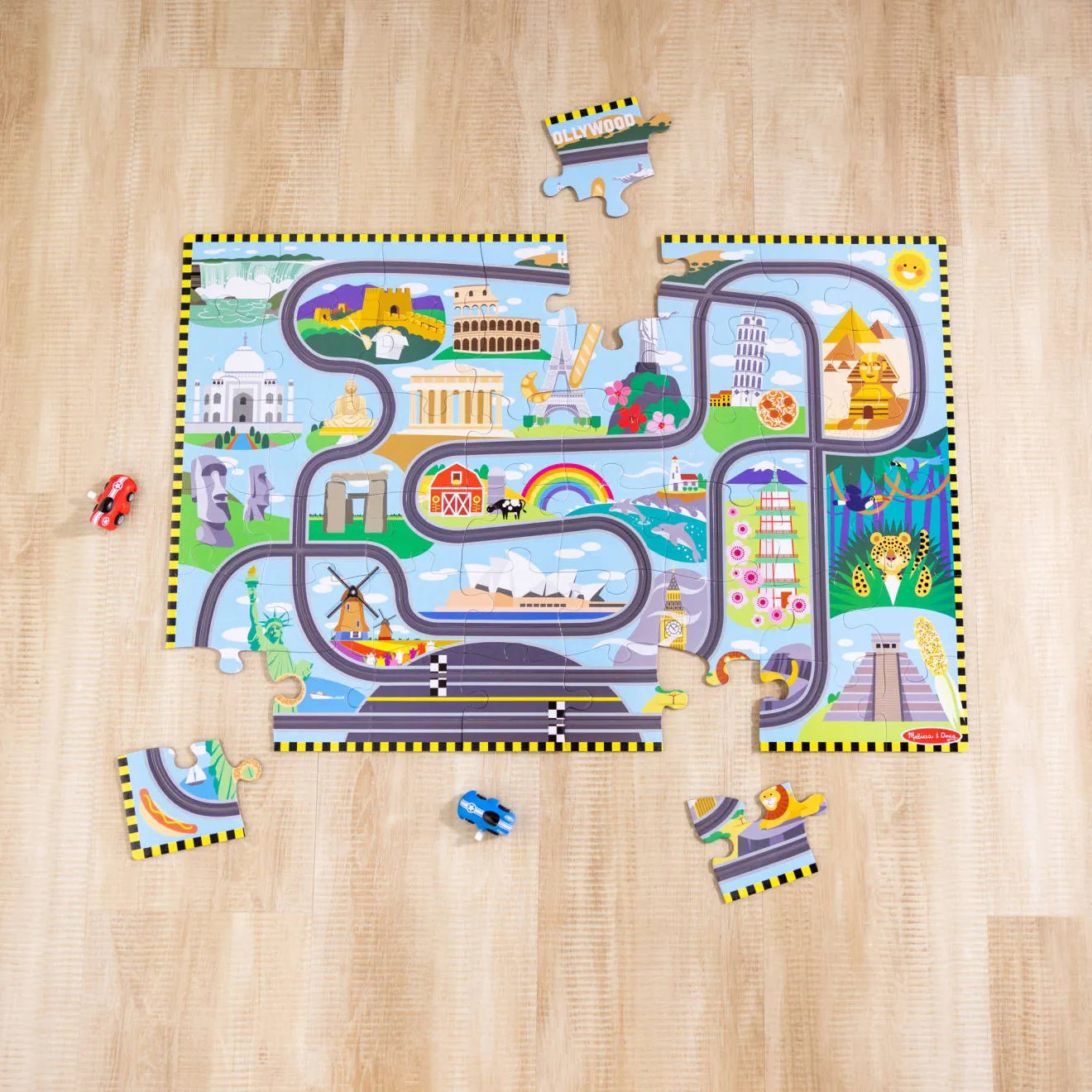 Melissa & Doug Race Around the World vloerpuzzel 48 stukjes