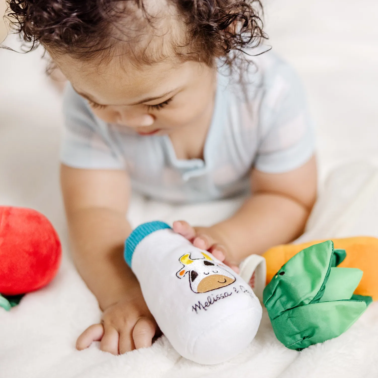 Melissa & Doug Market Basket Fill & Spill voeltasje 0-12m