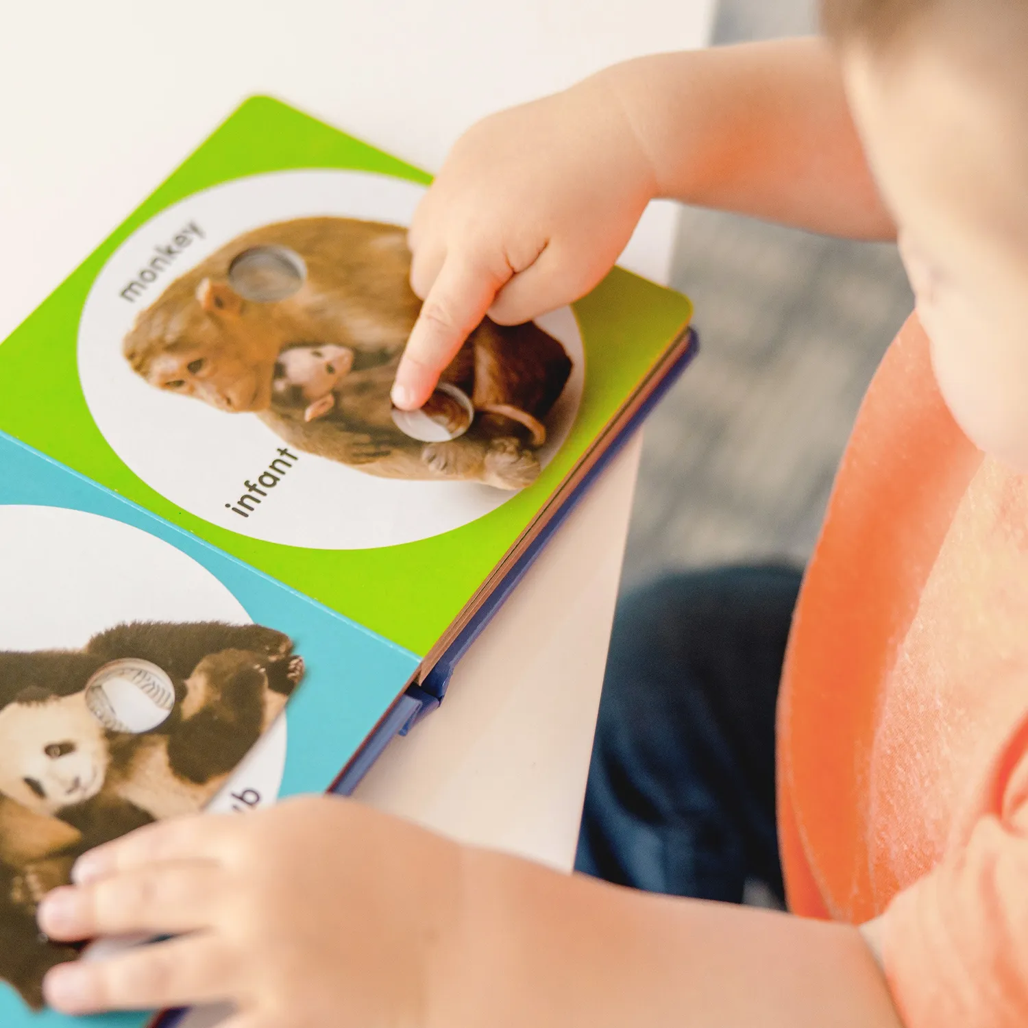 Melissa & Doug Poke-a-Dot Wilde Dierenfamilies kartonboek