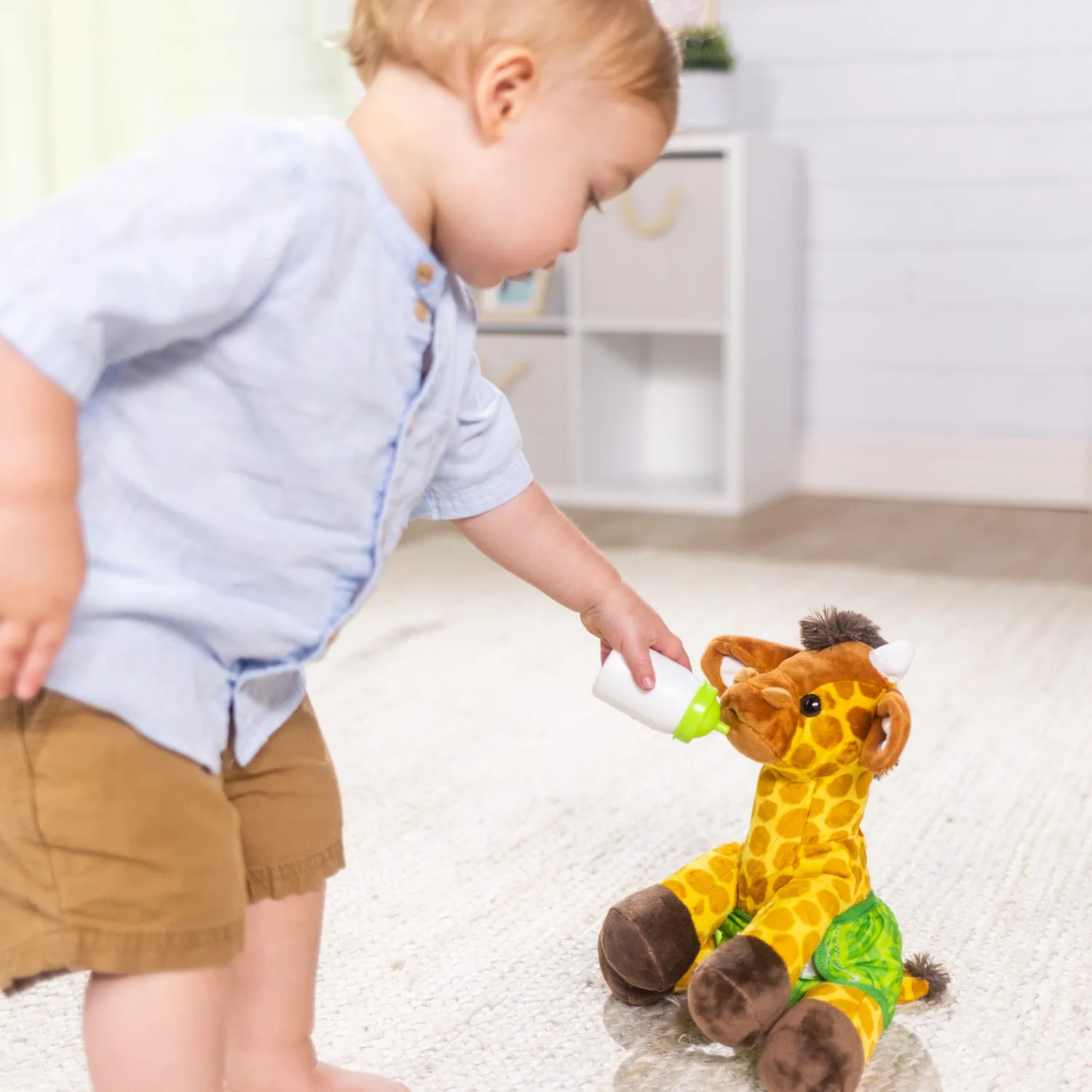 Melissa & Doug Baby Giraffe knuffel pluche 28 cm met flesje