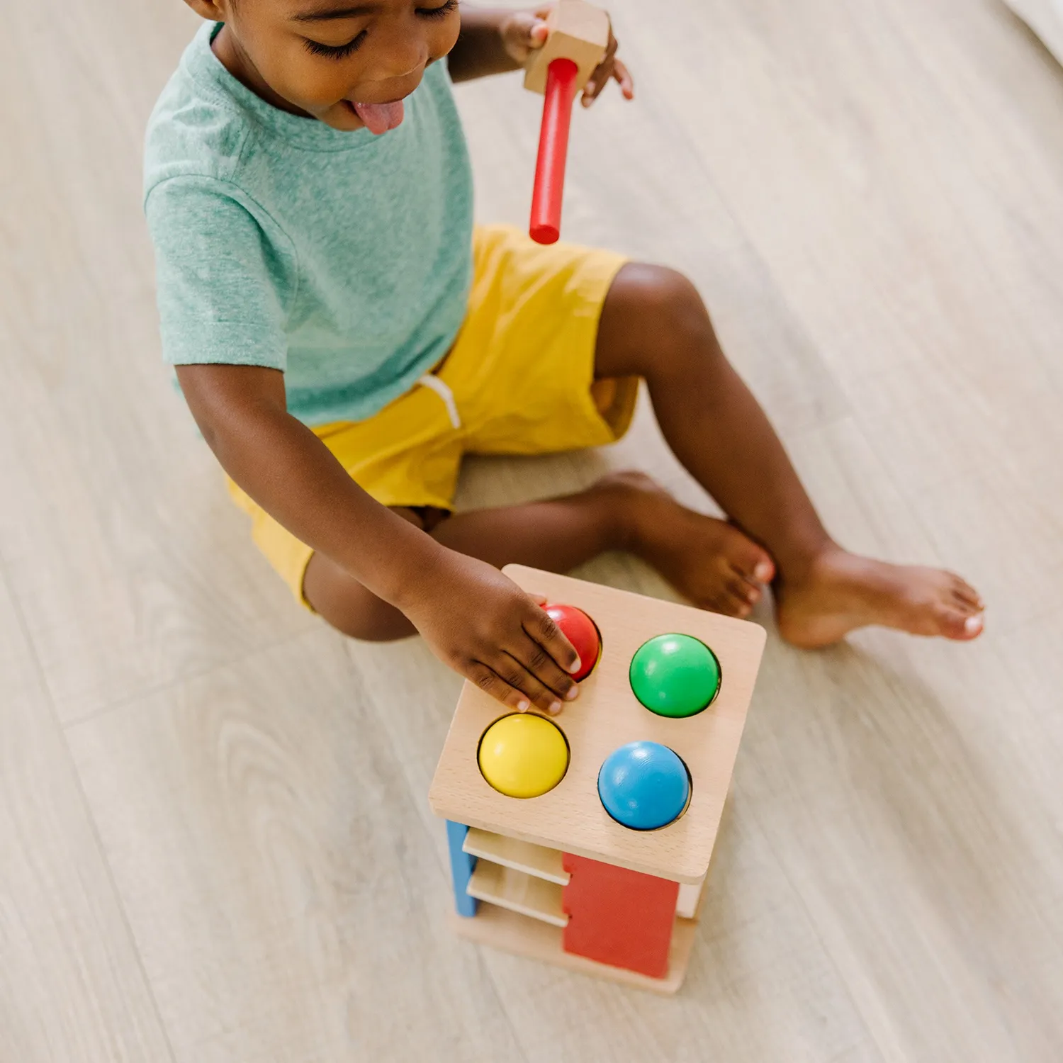 Melissa & Doug Pound & Roll Tower houten hamerspel 4 ballen