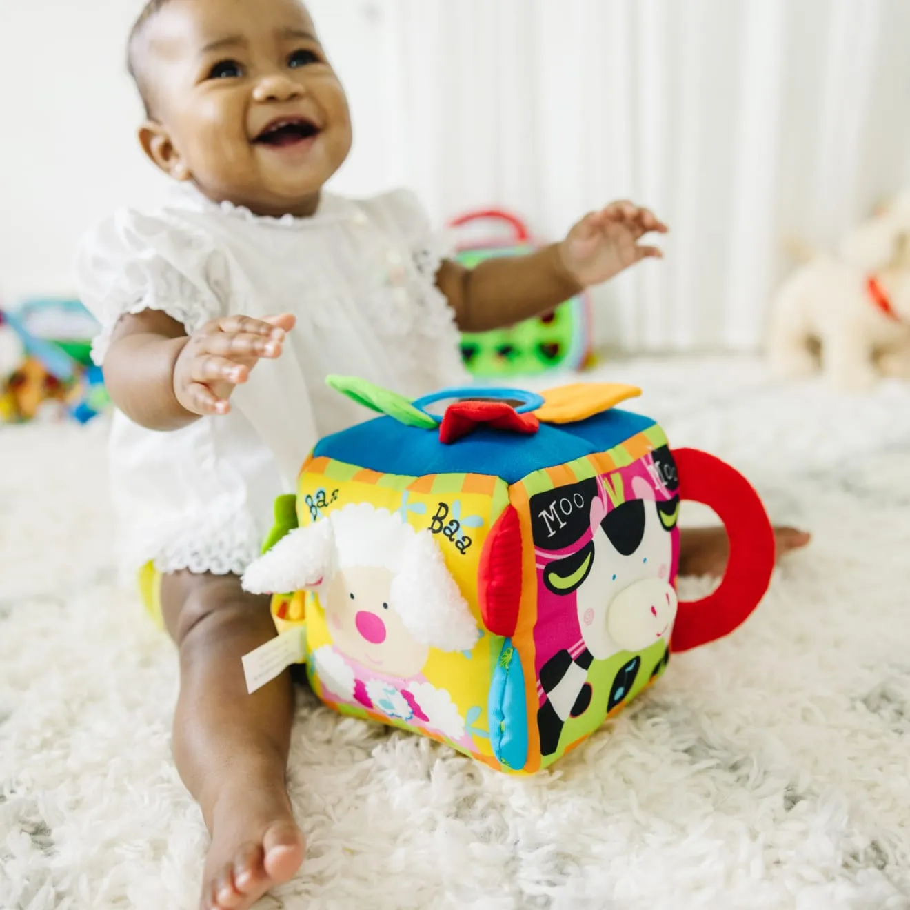 Melissa & Doug K's Kids Musical Farmyard Cube muziekblok baby