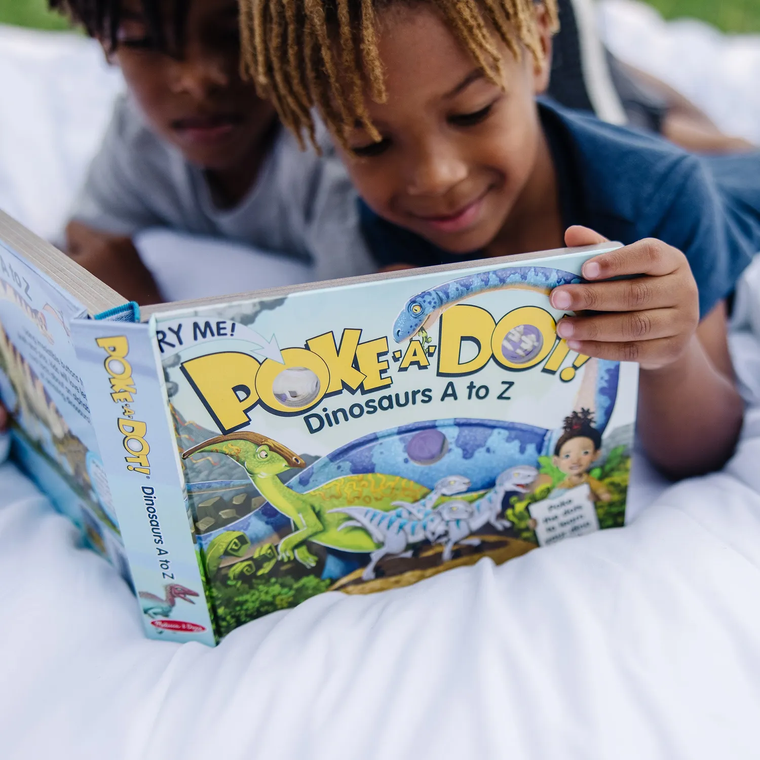 Melissa & Doug Poke-a-Dot Dino prikboek A tot Z