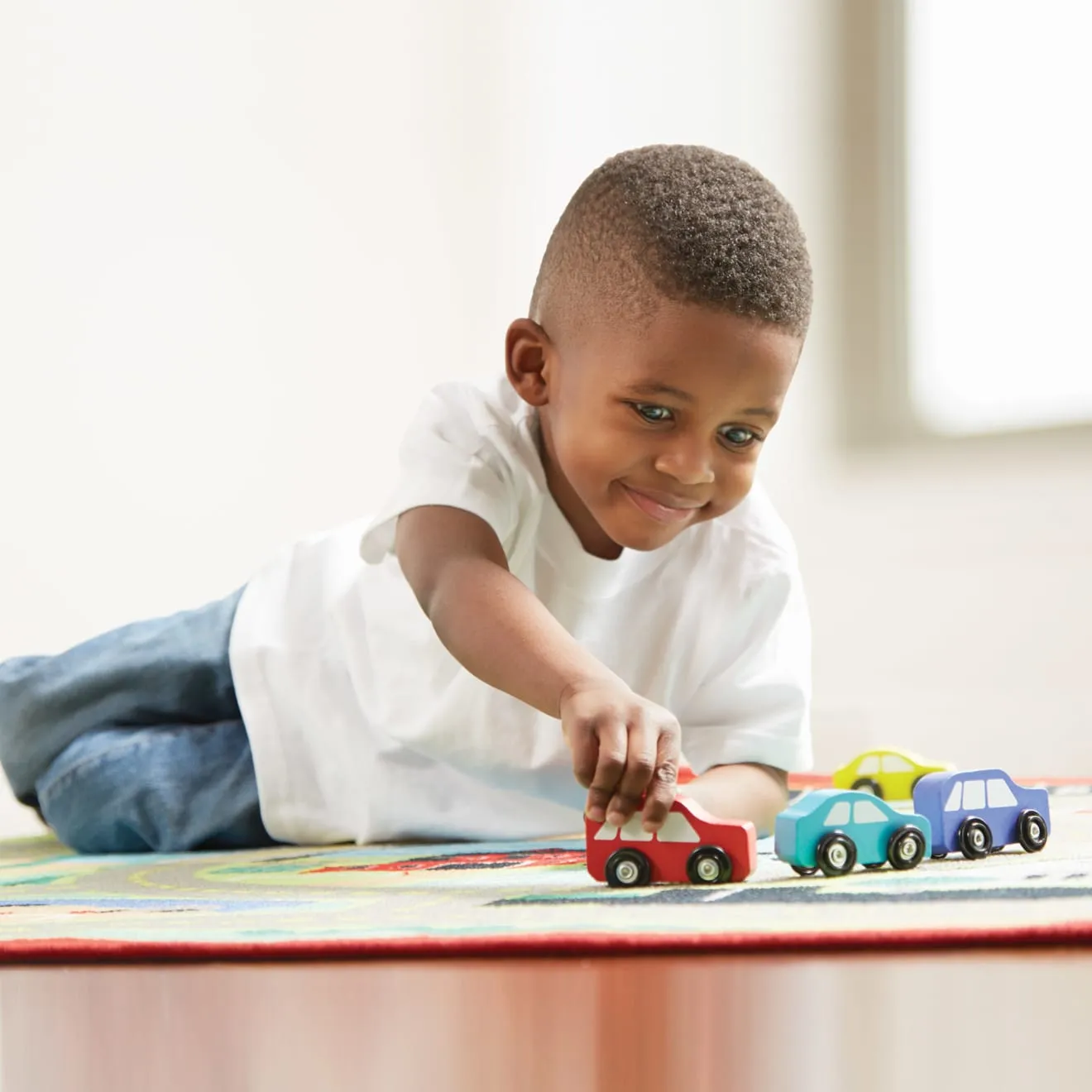 Melissa & Doug Round the Town speelkleed met 4 auto's