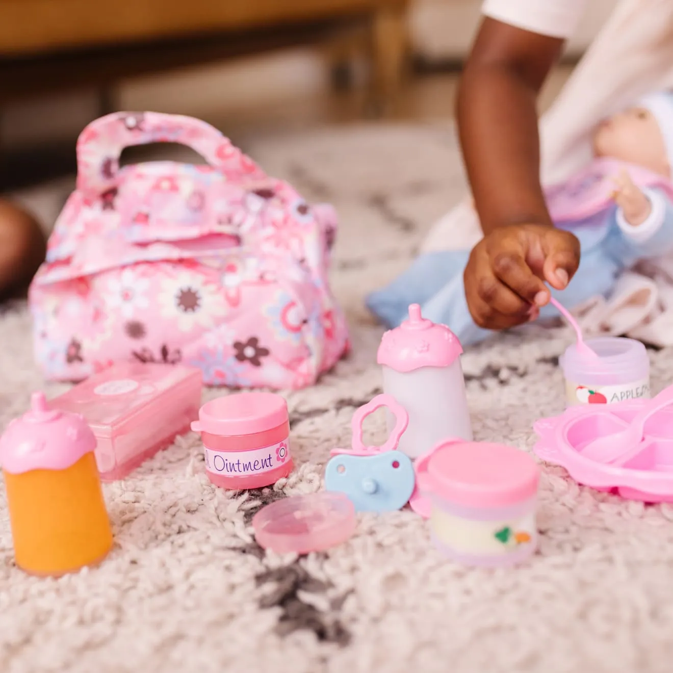 Melissa & Doug Mine to Love poppenaccessoires voeden en verschonen